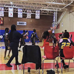 Burns Lady Panthers play basketball